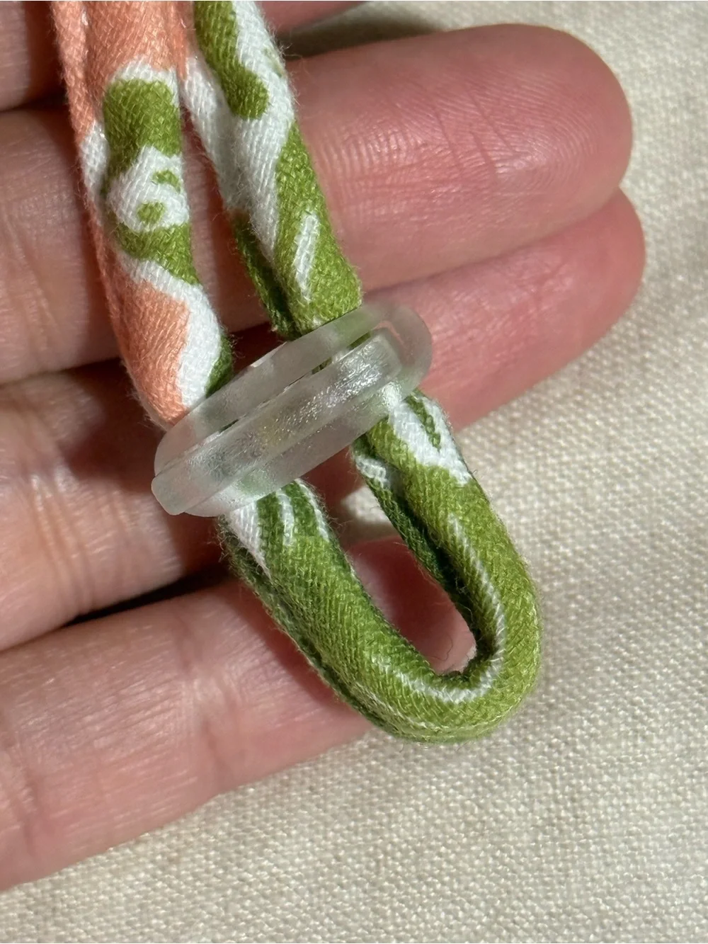 Lilly Pulitzer Coral Bucket Hat with Olive Tropical Leaf Pattern